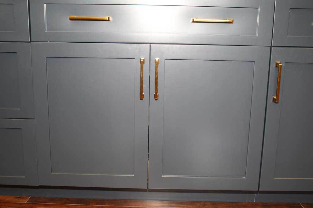 Hale Navy on cabinets with gold handles